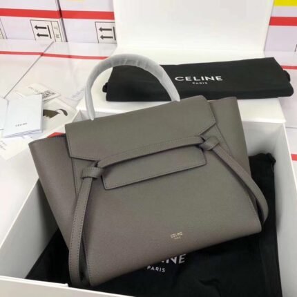 CELINE BELT MICRO MEDIUM GRAINED CALF LEATHER HANDBAGn9 X 8 X 5 INCHES (24 X 20 X 13 cm)n100% Calfskin Leathern100% Calfskin Leather LiningnGolden Metallic PiecesnMagnetic Snap Flap Locking Closure & Flap Under Zipper Locking ClosurenFlat Pocket InsidenFlat Pocket Outside on the BacknRemovable Leather Shoulder Strap L=20 INCHES (50 cm)n Handle length 4 inches (9 cm) n No. 175520p950n Elephant Grey