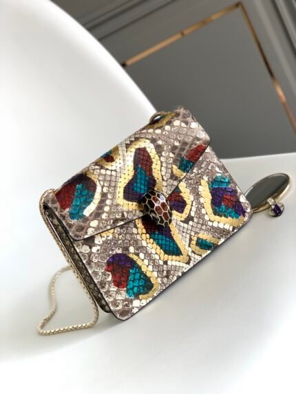 🔺Bvlga*🔺Serpenti Forever crossbody bag is the new Italian glamor. Featuring the colorful "Lunar" precious white onyx.
