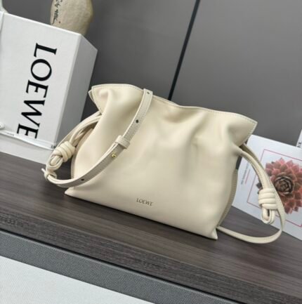 L⊚℮w℮🌟 NEW VERSION Napa Cowhide Leather Flamenco Fukubukuro 🆕 Clutch Bag n with drawstring closure and signature coiled knot Selected from the finest quality, soft calfskin leather, the Flamenco can hold, for example, a small wallet, all size cell phone or an A5 notebook* 0.5 liter capacity bottle and sunglasses* "over-the-shoulder" crossbody or clutch* Detachable and adjustable shoulder strap* Plain magnetic snap closure * Low-profile magnetic snap closure* Gold suede lining lo*ewe stamped in gold or silver🌟nModel No.: 262355nSize:23*18* 9cm n